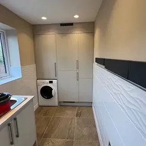 A laundry room with a washer and dryer.