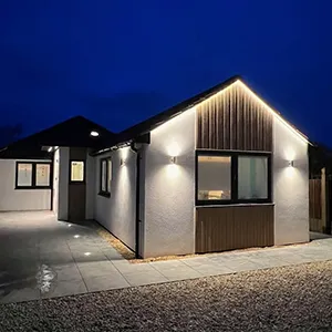 A house that is lit up at night.
