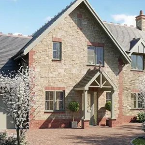 A large brick house with a white door and windows.