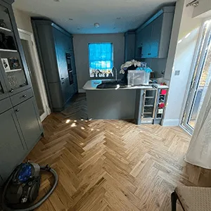 a room that has a hard wood floor in it
