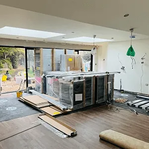a room that is being remodeled with wood flooring